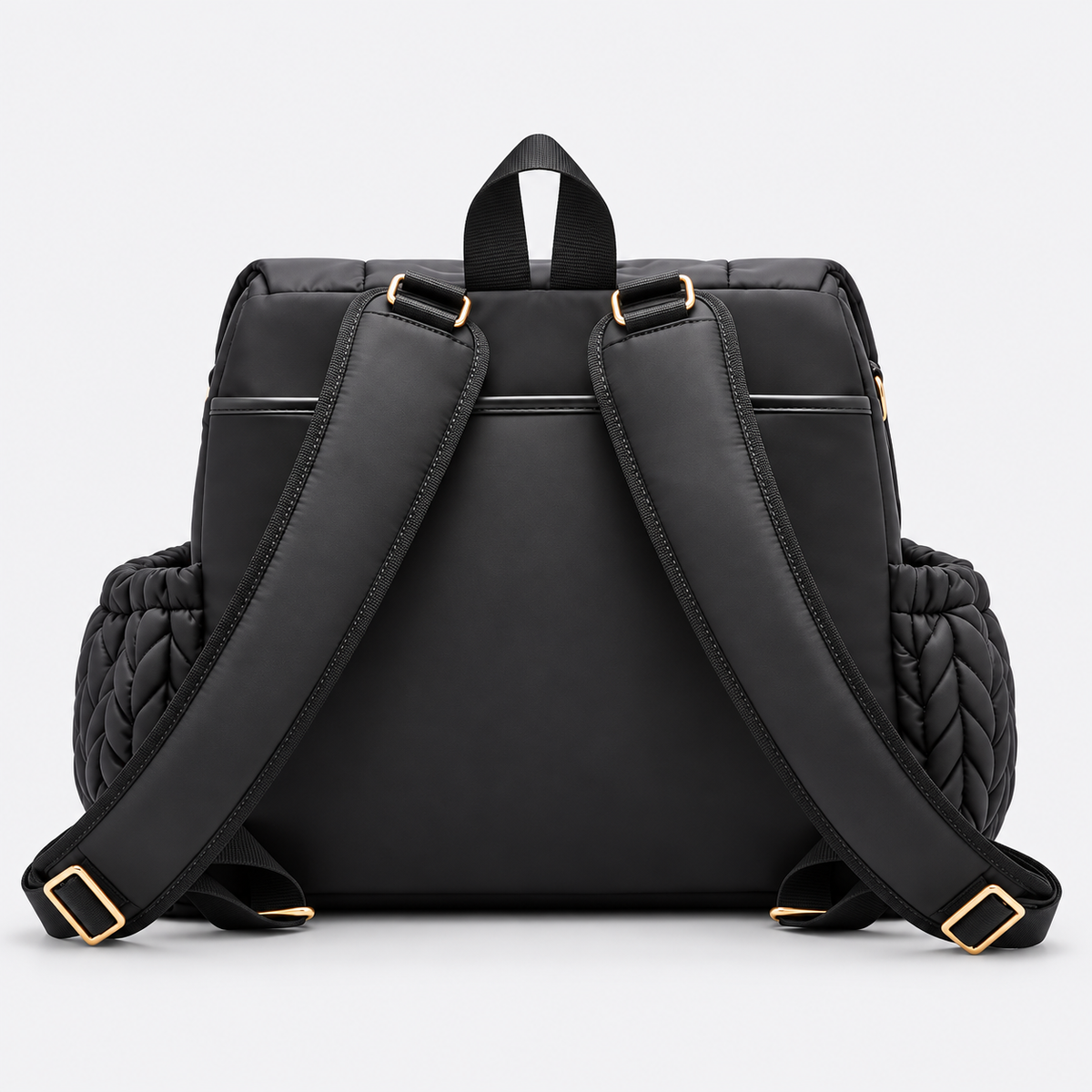 NAEVII Elara Diaper Bag Backpack in black, back view with padded shoulder straps, gold-tone buckles, top carry handle and quilted side pockets#Color_Black