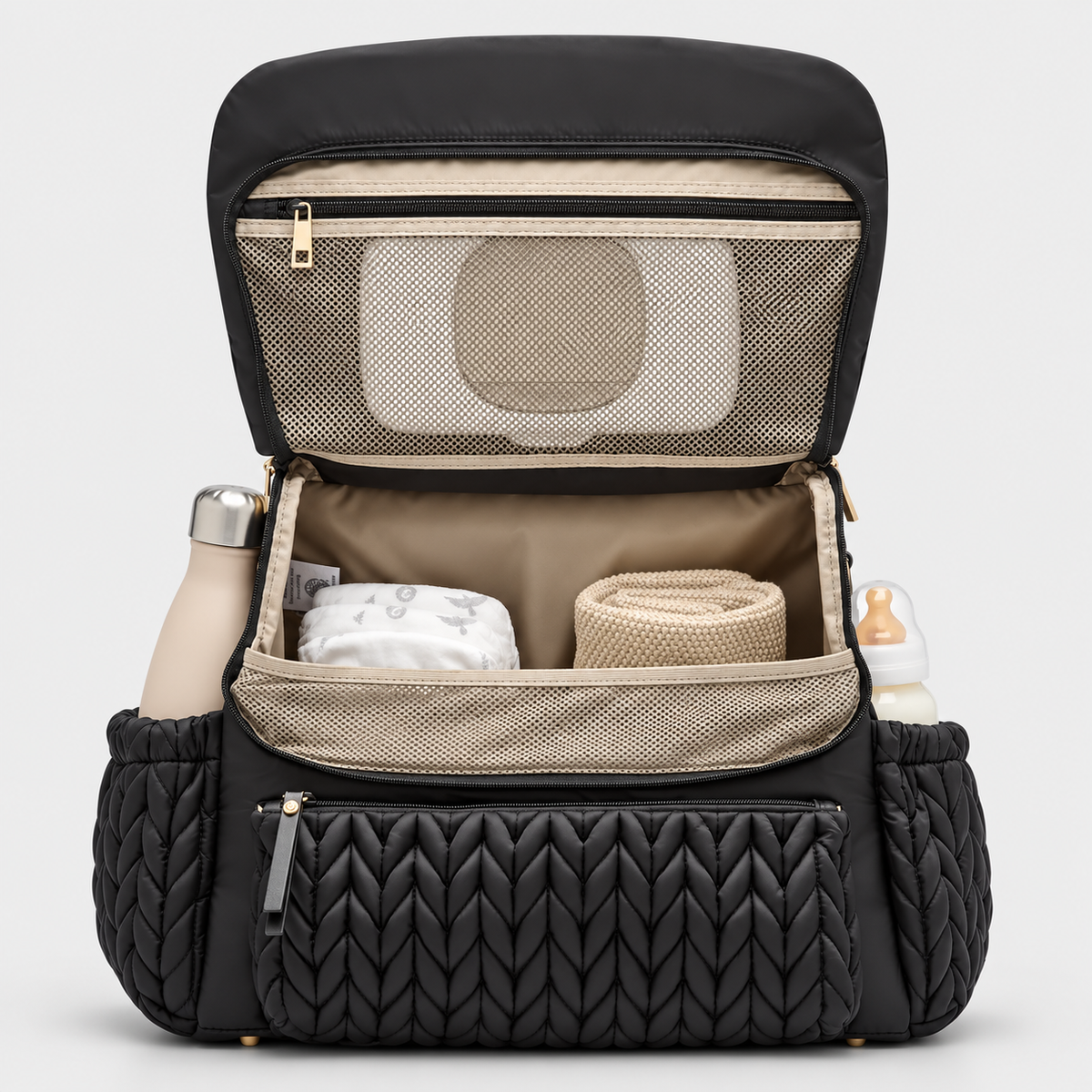 NAEVII Elara Diaper Bag Backpack in black, open front view showing beige lining, zippered mesh pocket inside the flap, main compartment with diaper and blanket, and side pockets holding a flask and baby bottle#Color_Black