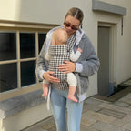 Mother carrying baby outdoors in NAEVII Soft Baby Carrier, black and white Houndstooth#Color_Houndstooth