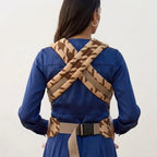 Crossable shoulder straps and waist buckle seen from behind, NAEVII Soft Baby Carrier in brown Mocha Houndstooth#Color_Mocha Houndstooth