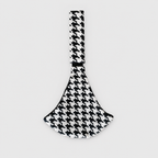 NAEVII Toddler Sling Carrier in black and white Houndstooth laid flat, full length with padded shoulder strap and rounded seat#Color_Houndstooth